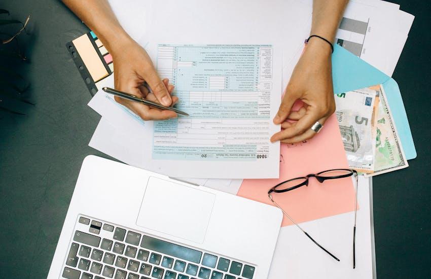 person doing their tax forms